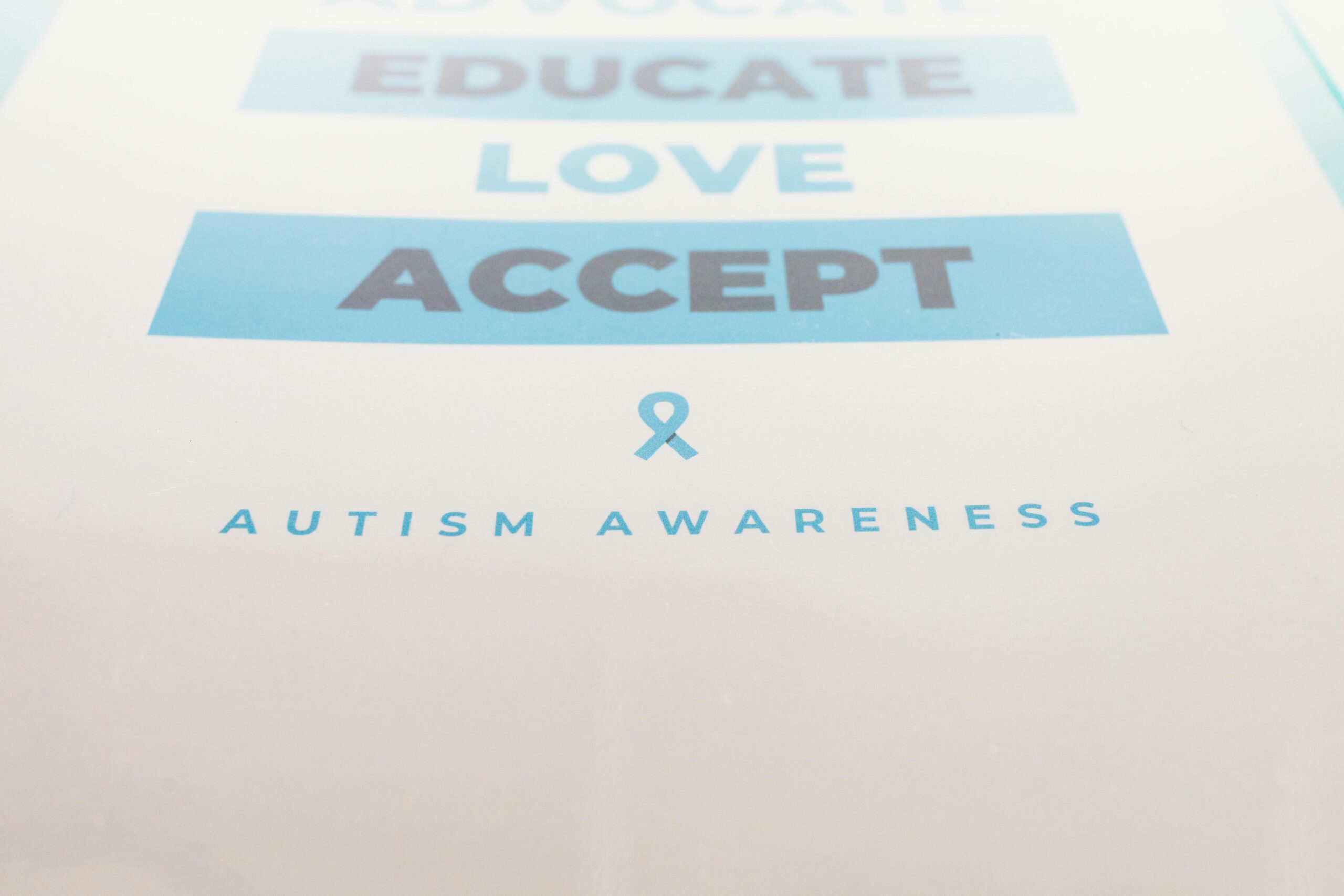 Inspirational poster advocating autism awareness with key messages.